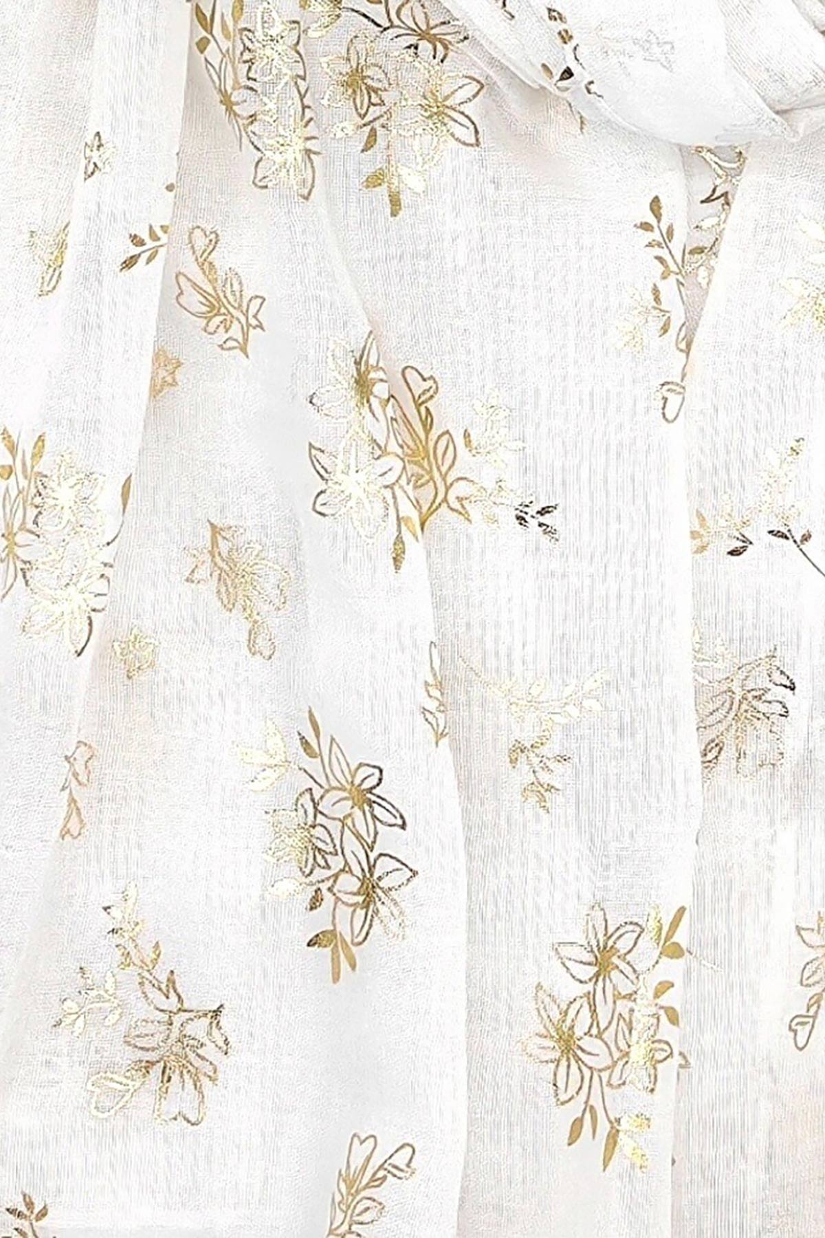 lefki-esarpa-me-louloudia-2 Εσάρπα με κεντημένα χρυσαφί λουλούδια, σε λευκή απόχρωση, από λεπτό βαμβακερό ύφασμα. Συνδυάστε το με ένα αμάνικο φόρεμα για τις δροσερές ημέρες ή το βράδυ. Ιδανικό αξεσουάρ για να δώσει ένα vintage touch στις εμφανίσεις σας!